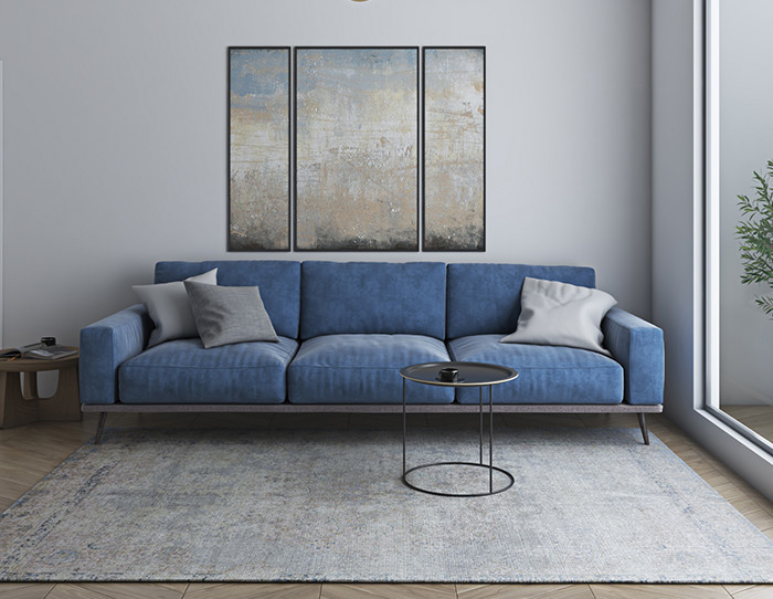 cream rug on grey carpet