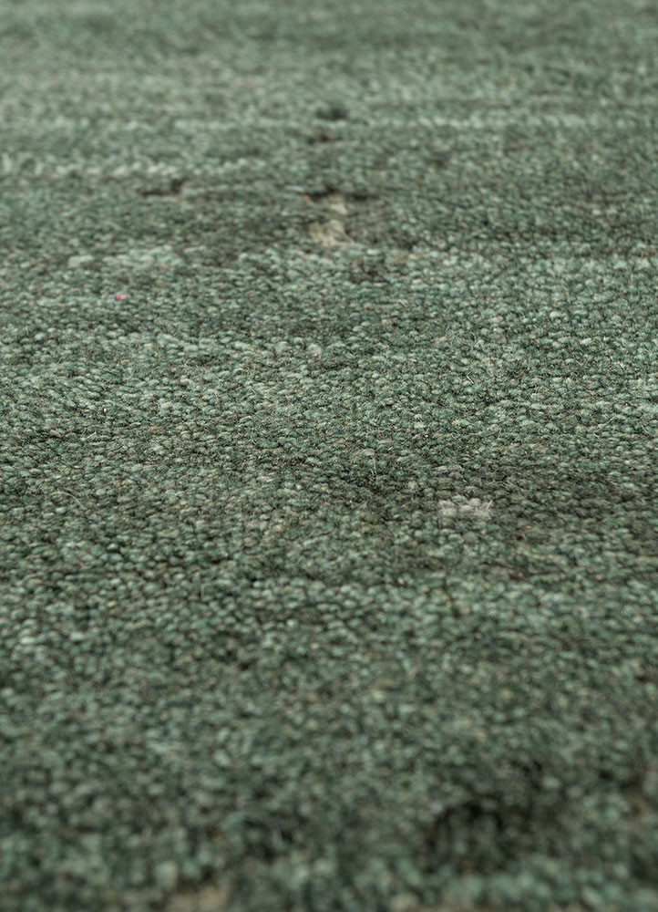 urban pause by kavi green wool hand knotted Rug - CloseUp