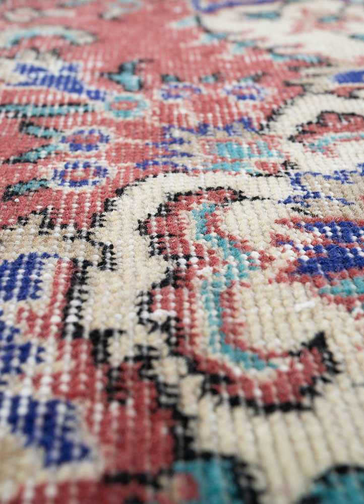 vintage red and orange wool hand knotted Rug - CloseUp