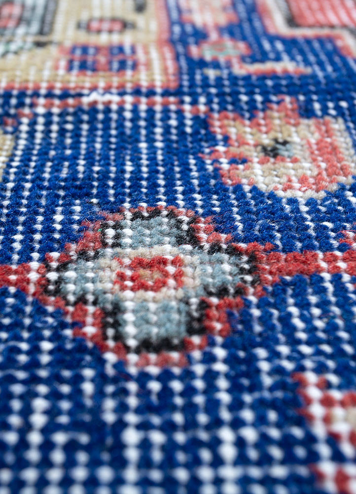vintage red and orange wool hand knotted Rug - CloseUp vintage red and orange wool hand knotted Rug - CloseUp