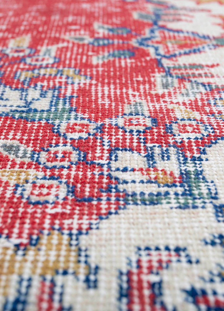 vintage red and orange wool hand knotted Rug - CloseUp