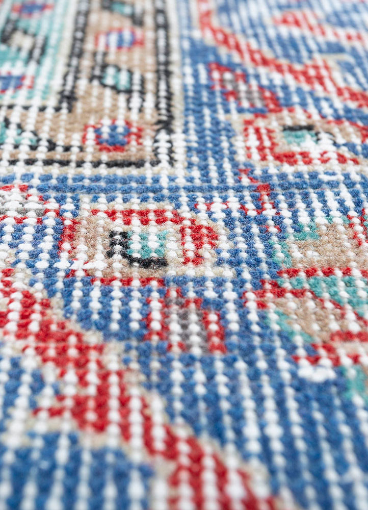 vintage red and orange wool hand knotted Rug - CloseUp vintage red and orange wool hand knotted Rug - CloseUp