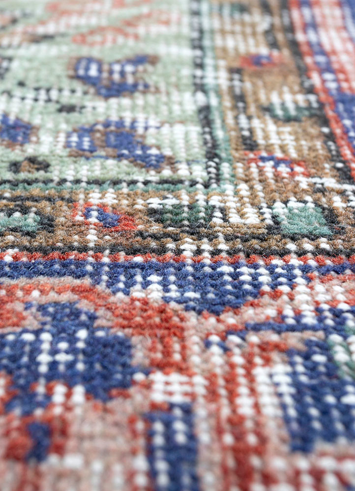 vintage red and orange wool hand knotted Rug - CloseUp