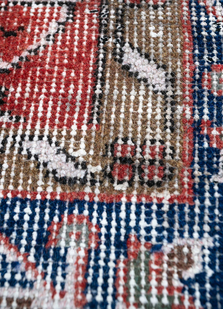 vintage red and orange wool hand knotted Rug - CloseUp