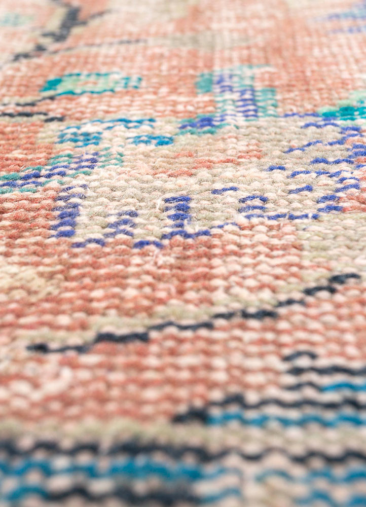 vintage red and orange wool hand knotted Rug - CloseUp