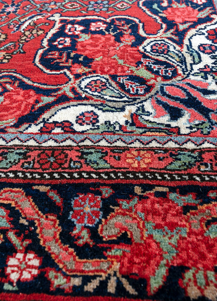 aalam red and orange wool hand knotted Rug - CloseUp