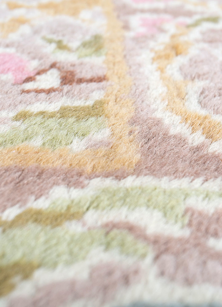 vintage pink and purple wool hand knotted Rug - CloseUp vintage pink and purple wool hand knotted Rug - CloseUp