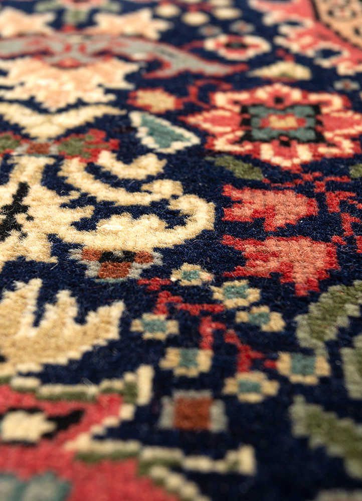 aalam red and orange wool hand knotted Rug - CloseUp