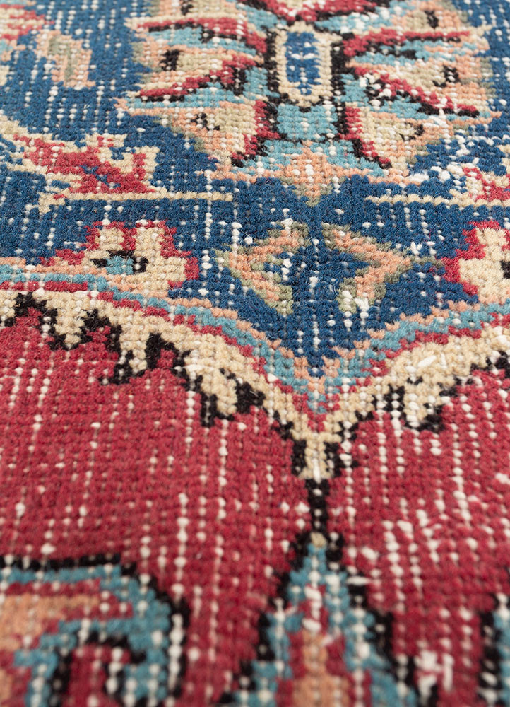 vintage red and orange wool hand knotted Rug - CloseUp