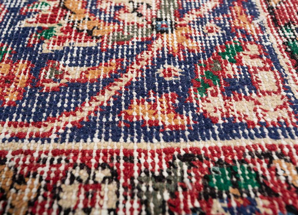 vintage red and orange wool hand knotted Rug - CloseUp