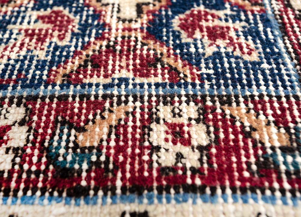 vintage red and orange wool hand knotted Rug - CloseUp