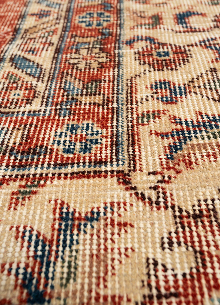 vintage red and orange wool hand knotted Rug - CloseUp vintage red and orange wool hand knotted Rug - CloseUp