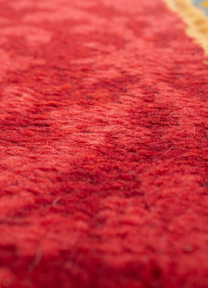 aalam red and orange wool hand knotted Rug - CloseUp