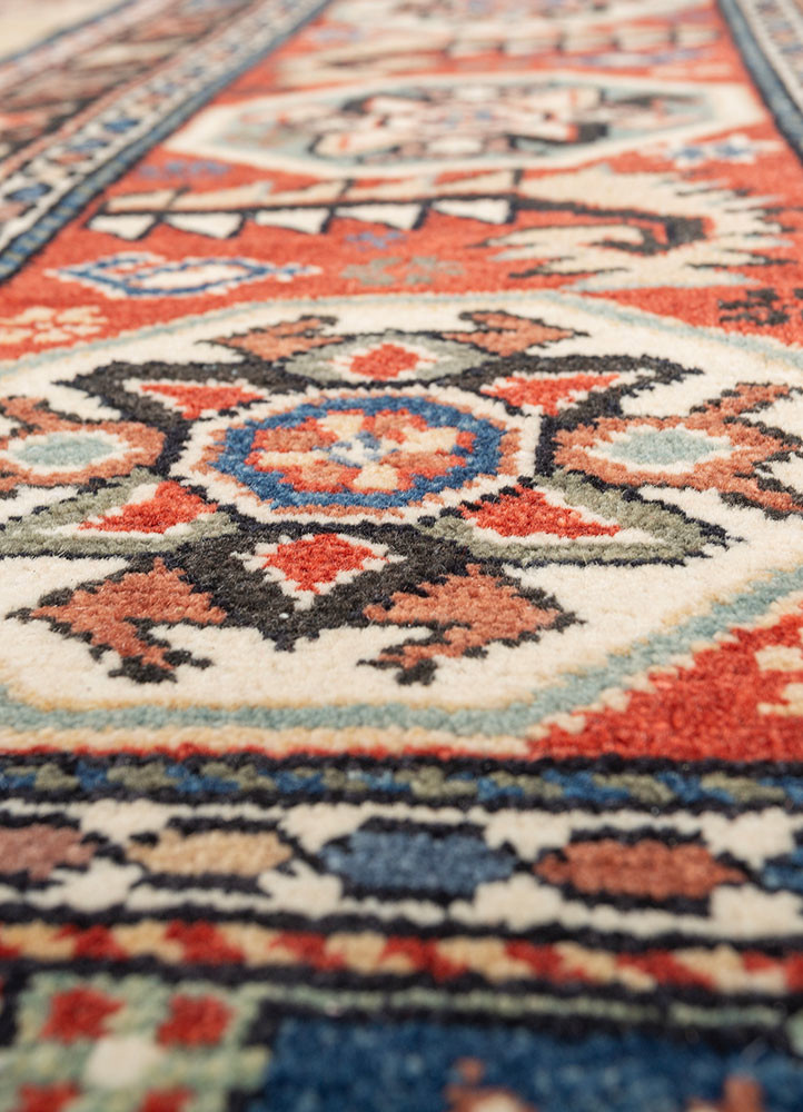 aalam red and orange wool hand knotted Rug - CloseUp