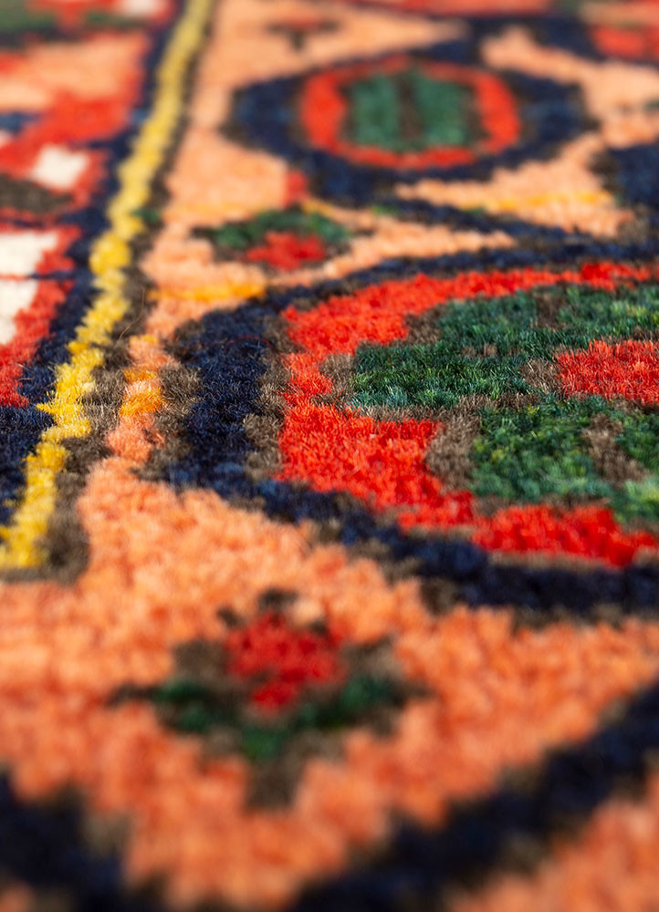 aalam red and orange wool hand knotted Rug - CloseUp