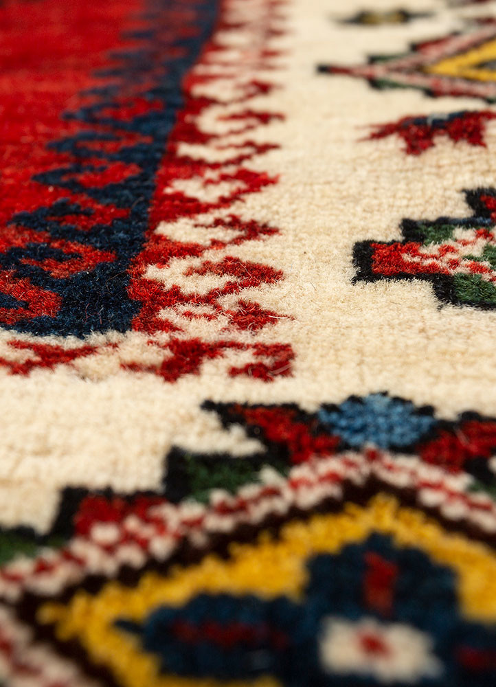 aalam red and orange wool hand knotted Rug - CloseUp