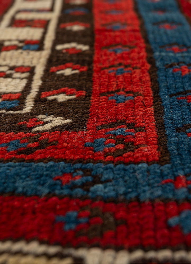 aalam red and orange wool hand knotted Rug - CloseUp