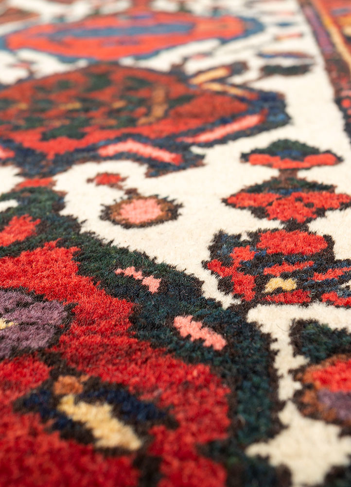 aalam red and orange wool hand knotted Rug - CloseUp