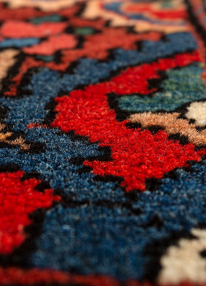 aalam red and orange wool hand knotted Rug - CloseUp