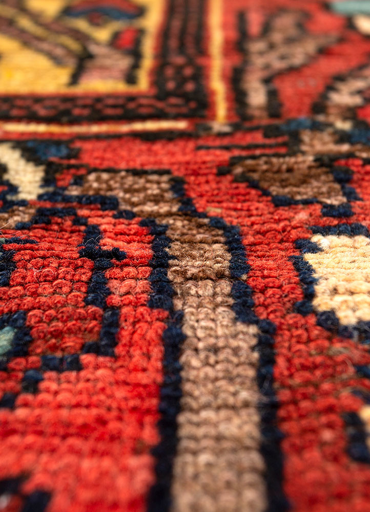 aalam red and orange wool hand knotted Rug - CloseUp