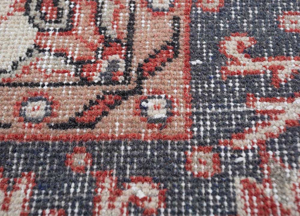 vintage red and orange wool hand knotted Rug - CloseUp
