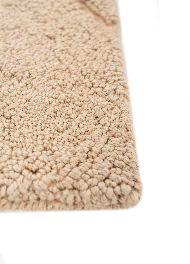 nomadic threads ivory jute and hemp hand tufted Rug - Corner