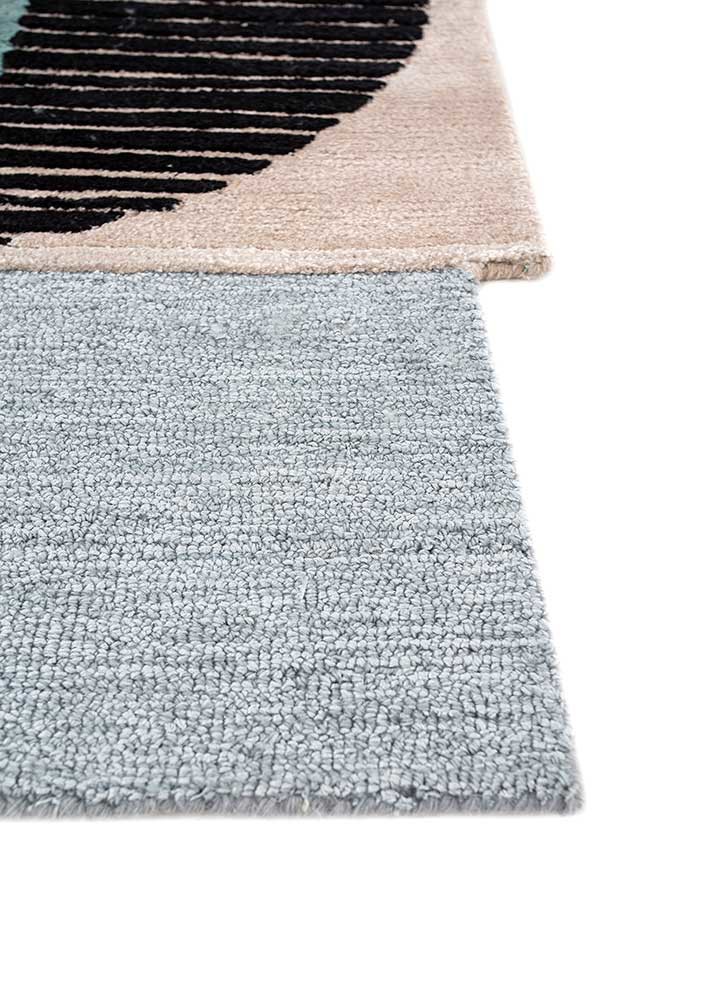 come around blue wool and viscose hand tufted Rug - Corner