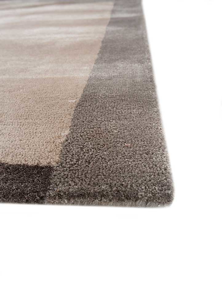 come around ivory wool and viscose hand tufted Rug - Corner