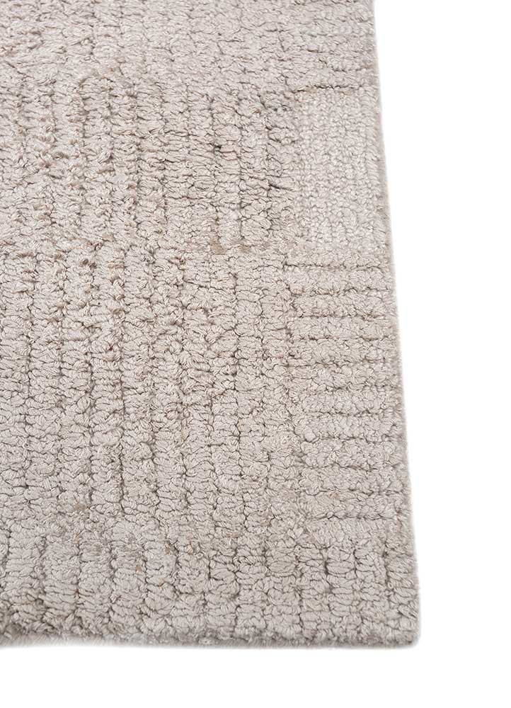 come around ivory wool and viscose hand tufted Rug - Corner