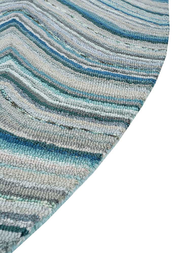 come around blue wool and viscose hand tufted Rug - Corner