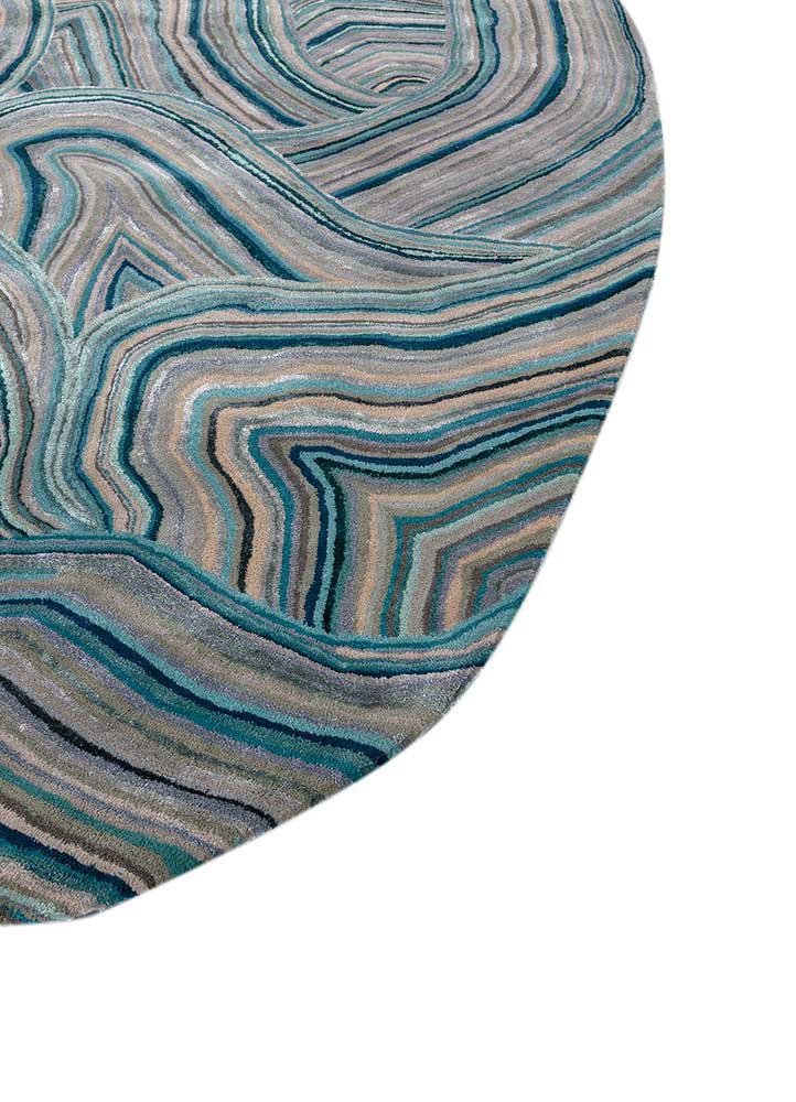 come around blue wool and viscose hand tufted Rug - Corner
