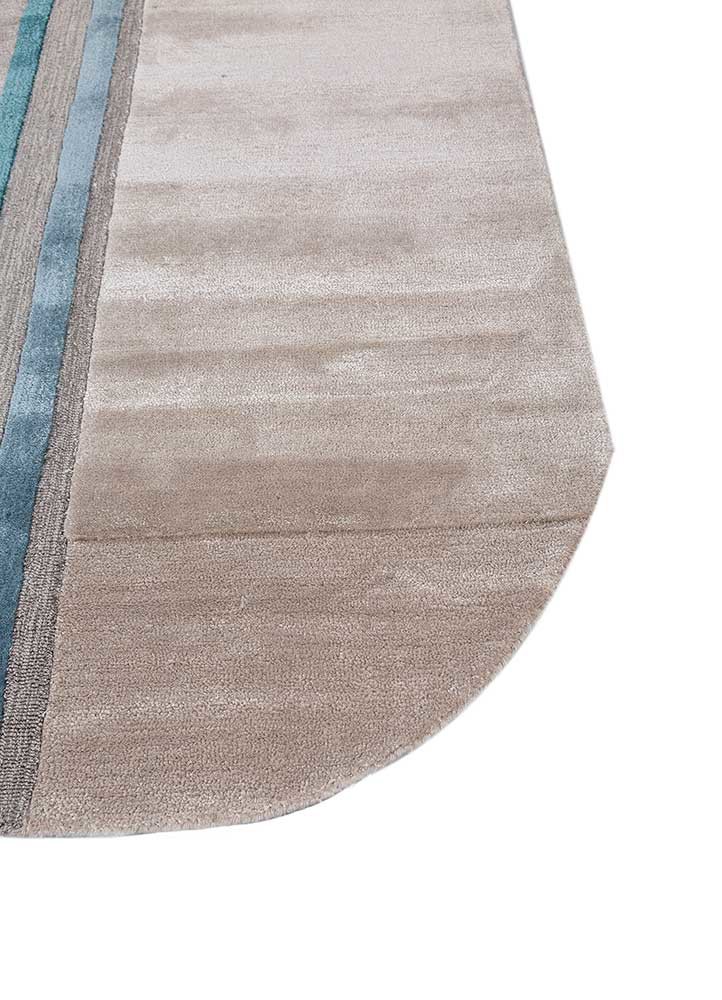 come around ivory wool and viscose hand tufted Rug - Corner