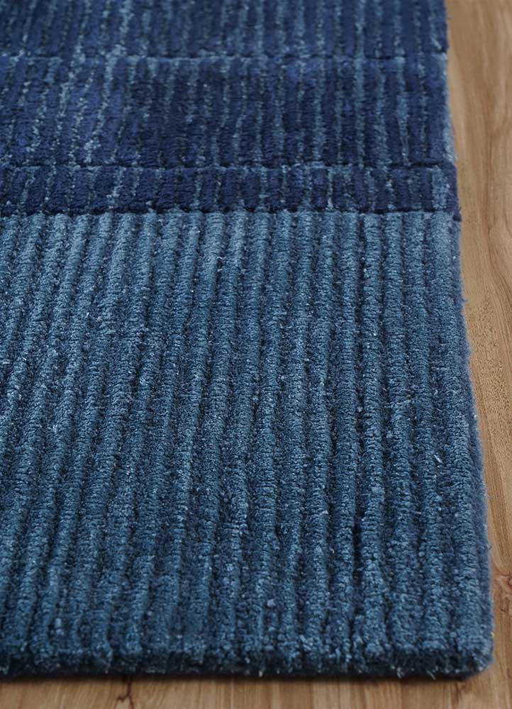 come around blue wool and viscose hand tufted Rug - Corner