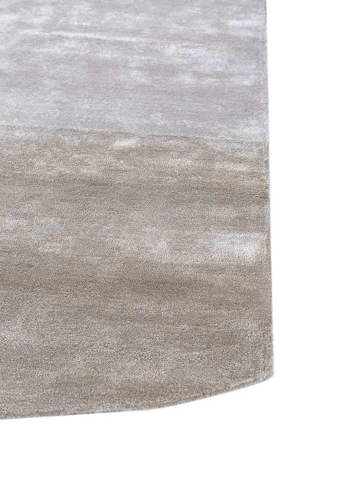 come around blue viscose hand tufted Rug - Corner