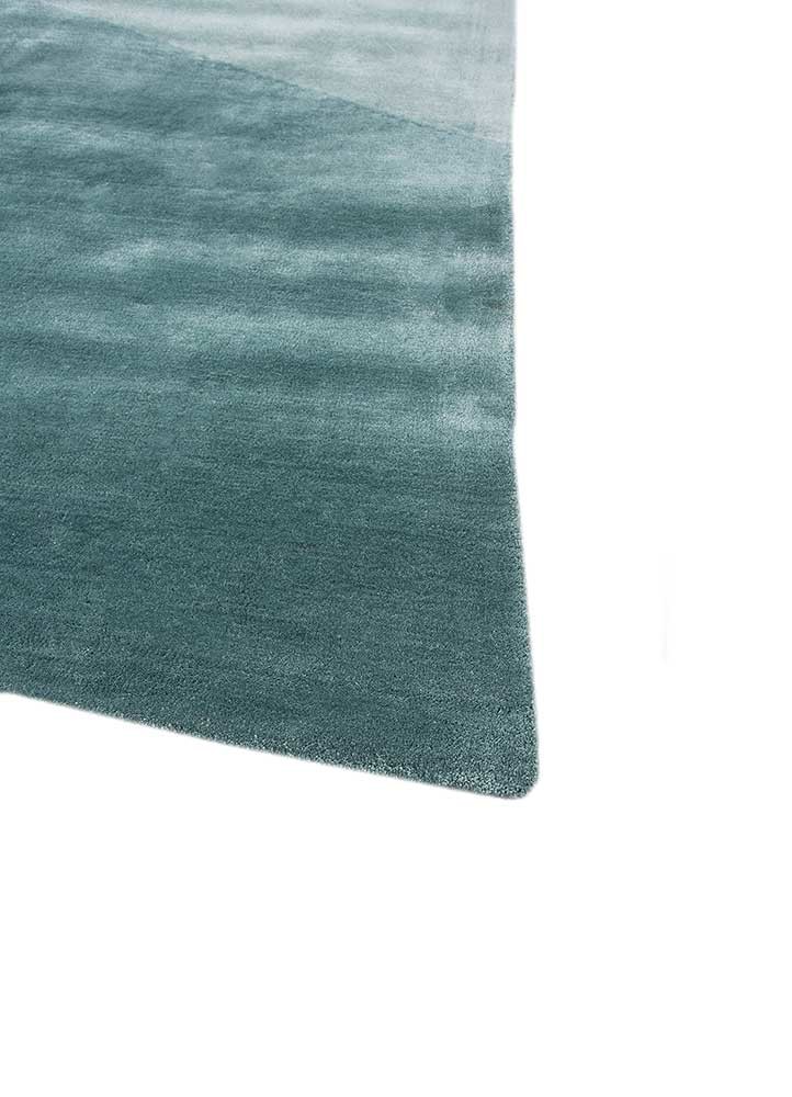 come around blue viscose hand tufted Rug - Corner
