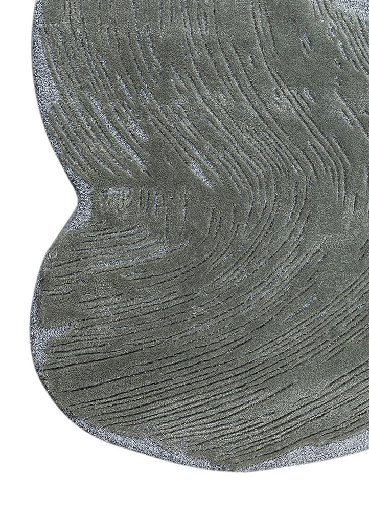 infini blue wool and viscose hand tufted Rug - Corner