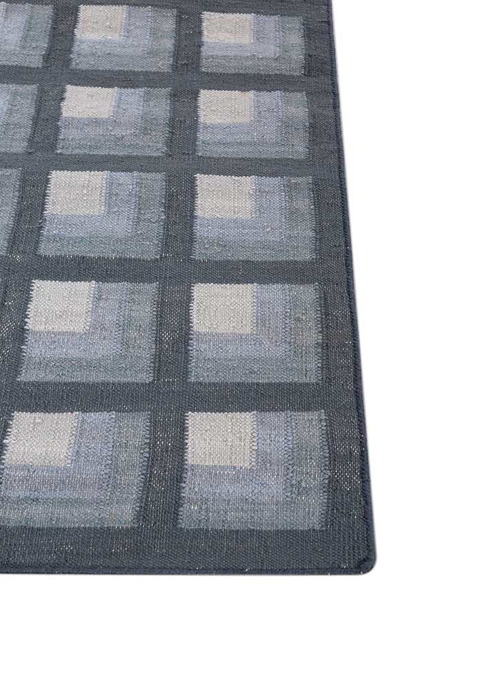 checkers blue wool flat weaves Rug - Corner