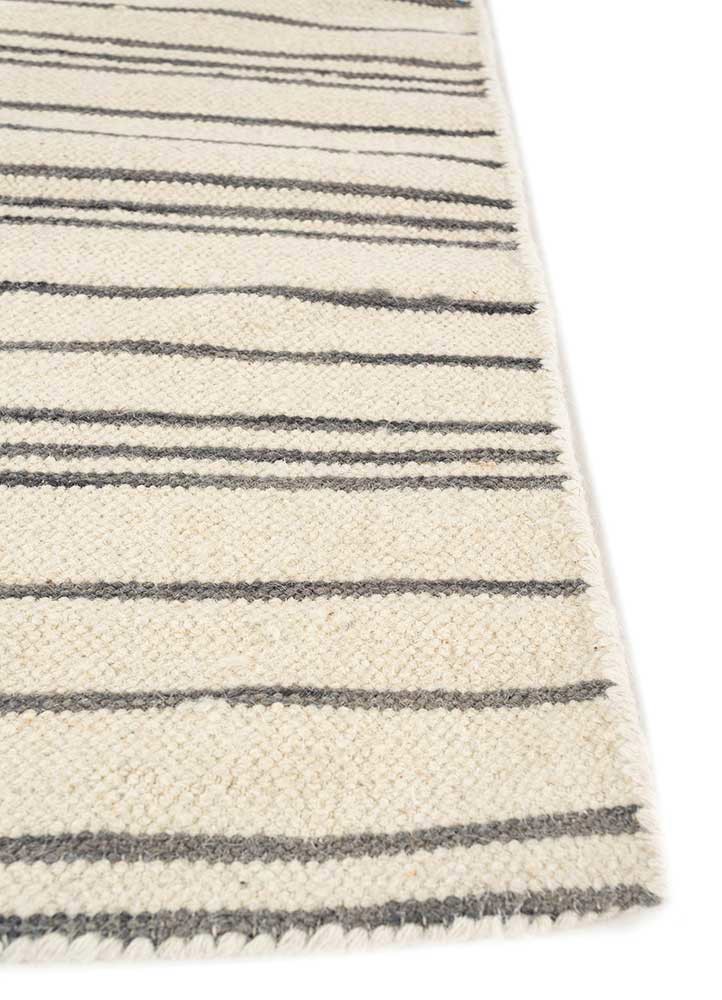 indusbar ivory wool flat weaves Rug - Corner