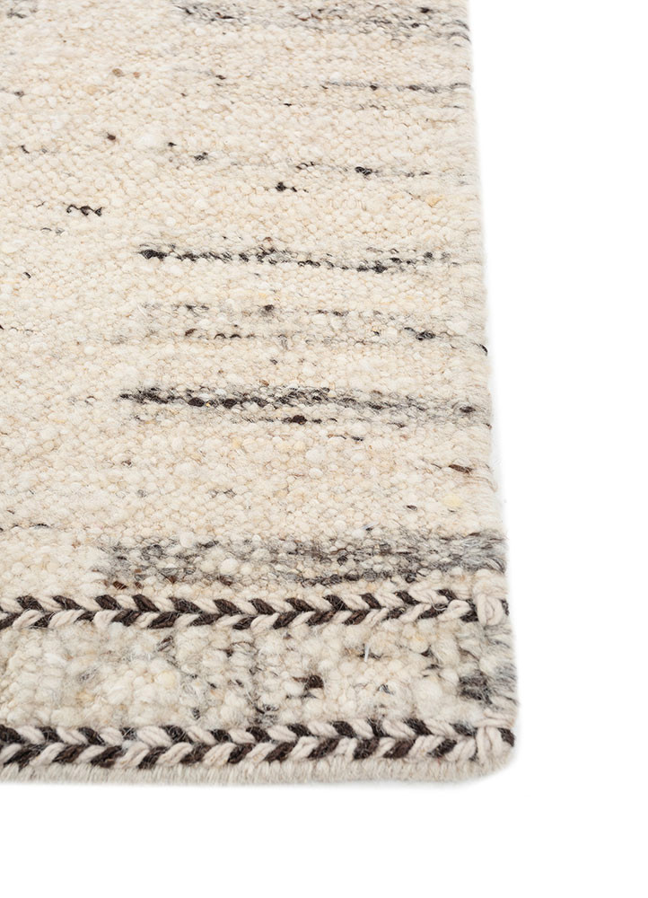 abrash ivory wool flat weaves Rug - Corner