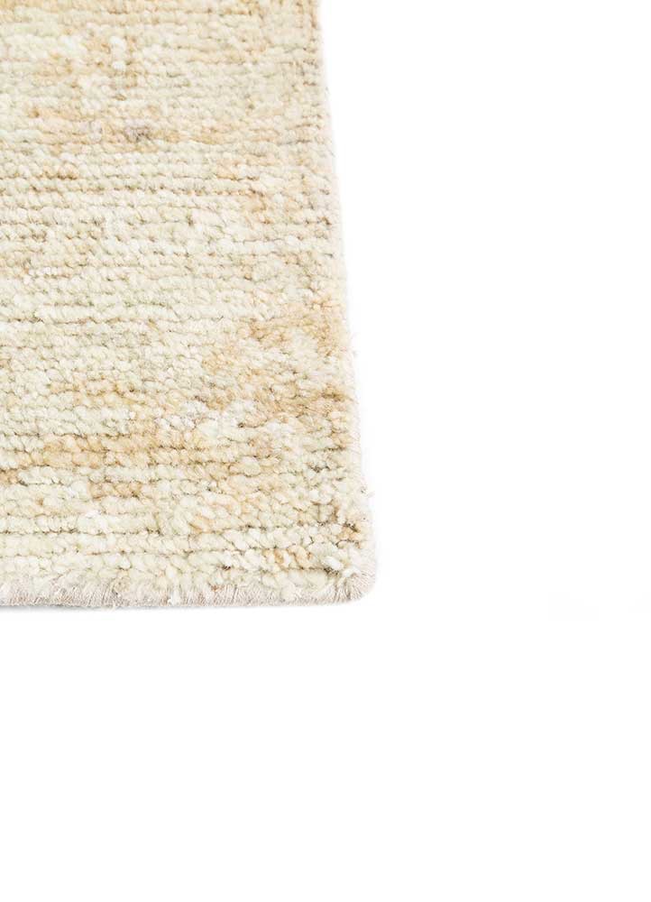 entropy gold wool hand knotted Rug - Corner