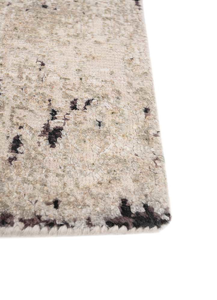 entropy ivory wool and silk hand knotted Rug - Corner