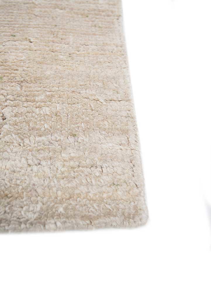 entropy ivory wool and silk hand knotted Rug - Corner