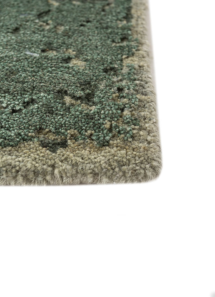 urban pause by kavi green wool hand knotted Rug - Corner
