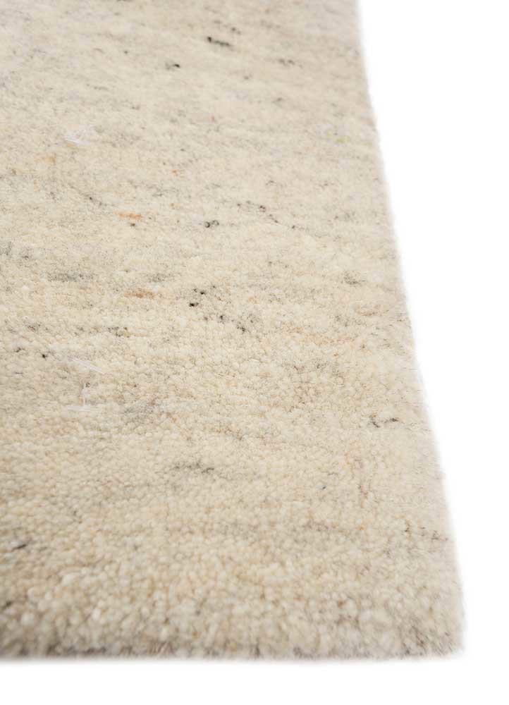 urban pause by kavi ivory wool and silk hand knotted Rug - Corner urban pause by kavi ivory wool and silk hand knotted Rug - Corner