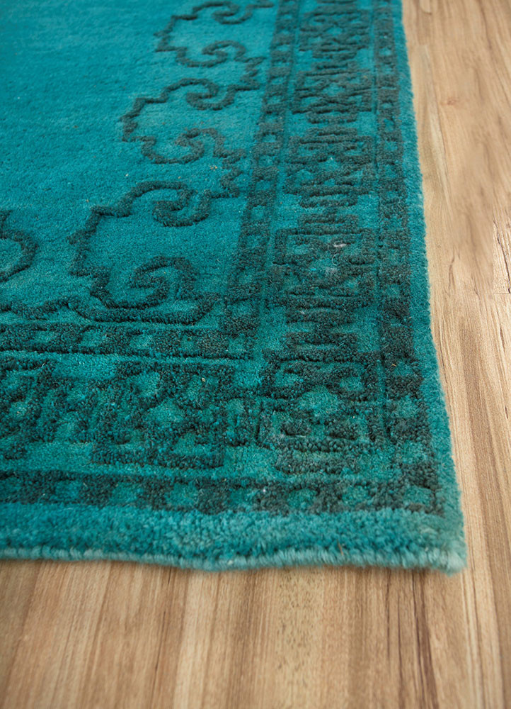 majnun green wool hand knotted Rug - Corner