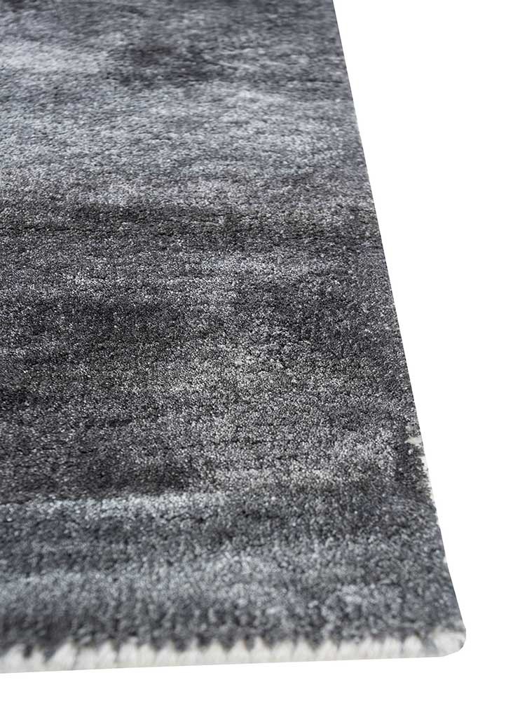 unfold by kavi grey and black wool and bamboo silk hand knotted Rug - Corner