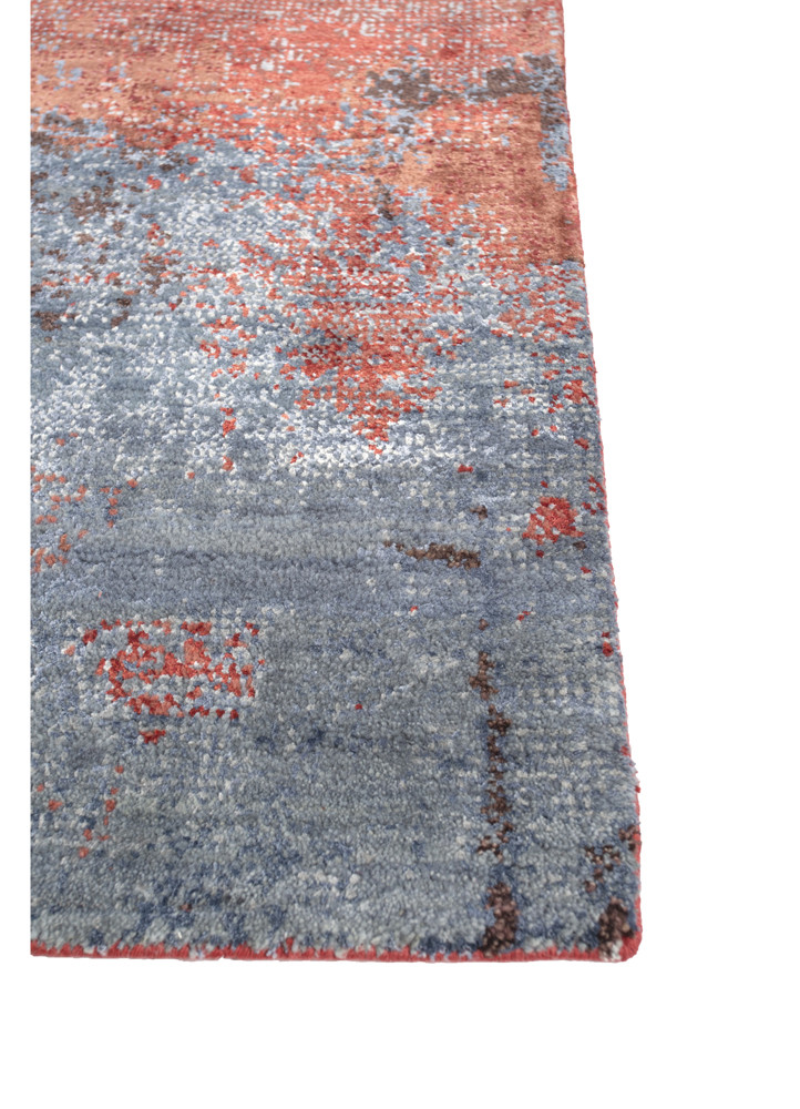 afterglow by kavi red and orange wool and bamboo silk hand knotted Rug - Corner