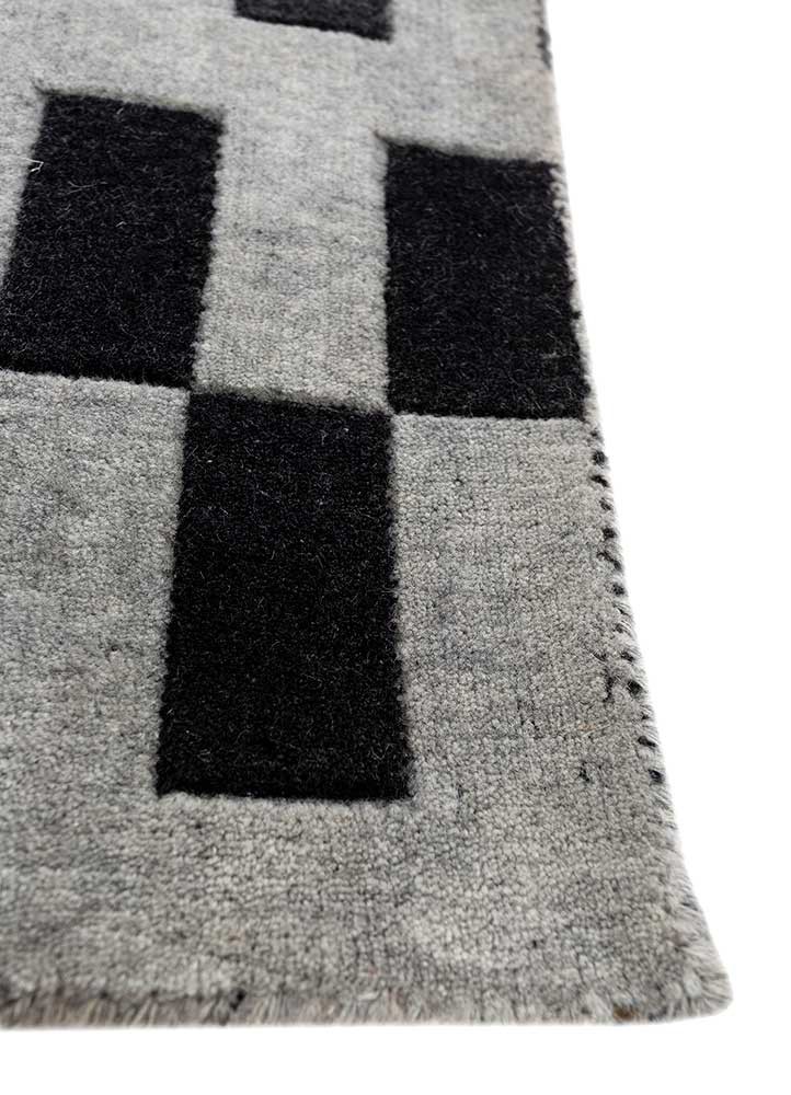 jean grey and black wool hand loom Rug - Corner