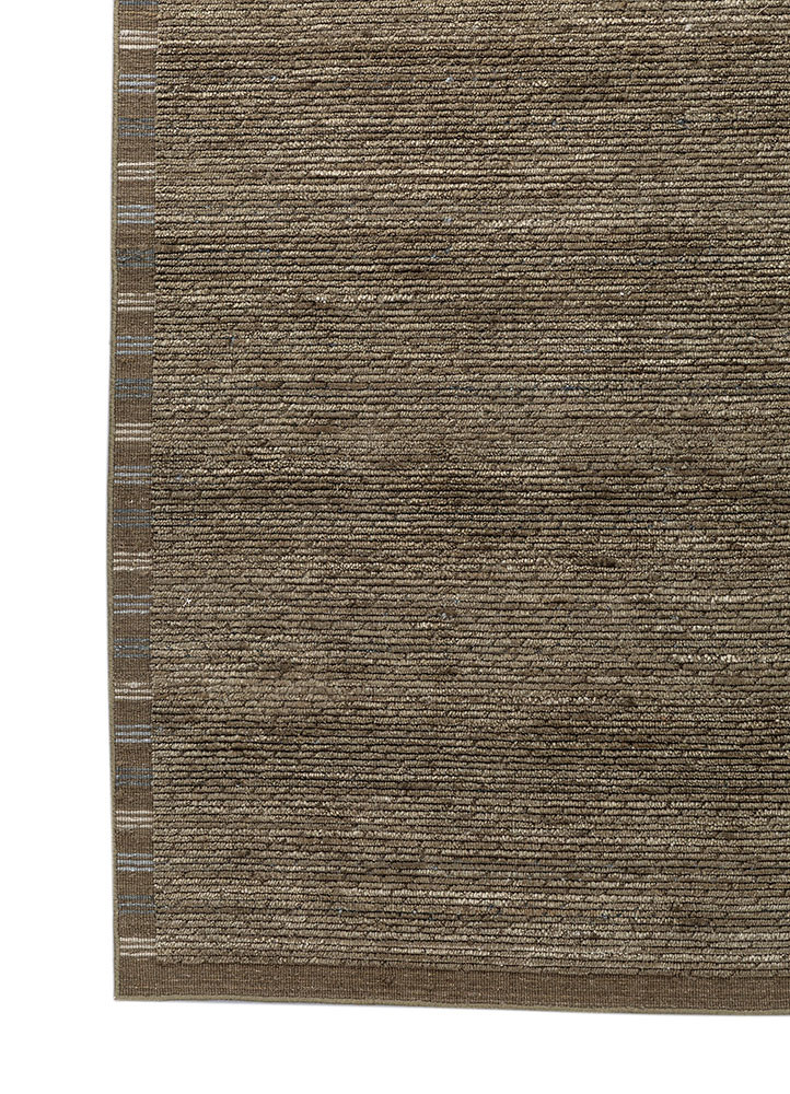 basis green wool hand loom Rug - Corner