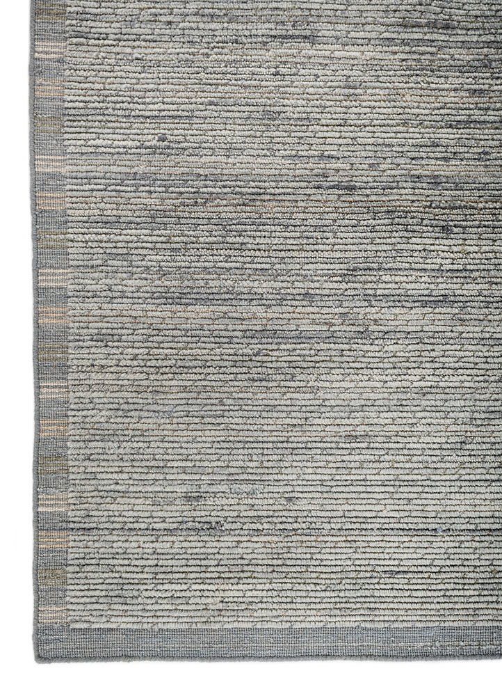 basis green wool hand loom Rug - Corner